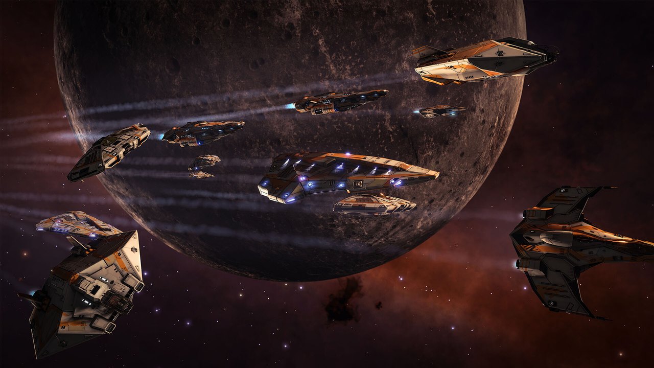 A formation of ships flying past a planet in Elite Dangerous